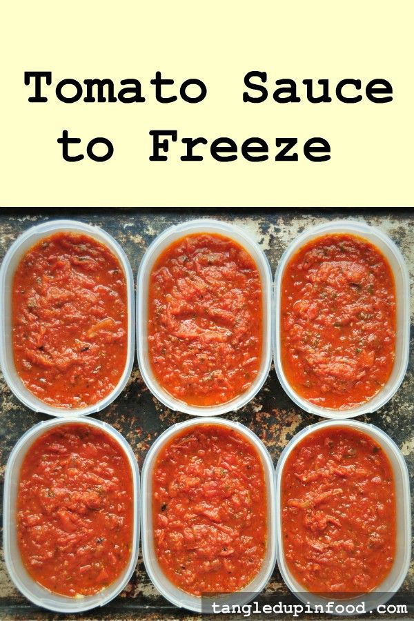 six plastic containers filled with tomato sauce on top of a granite counter next to text overlay that says tomato sauce to sauce to freeze