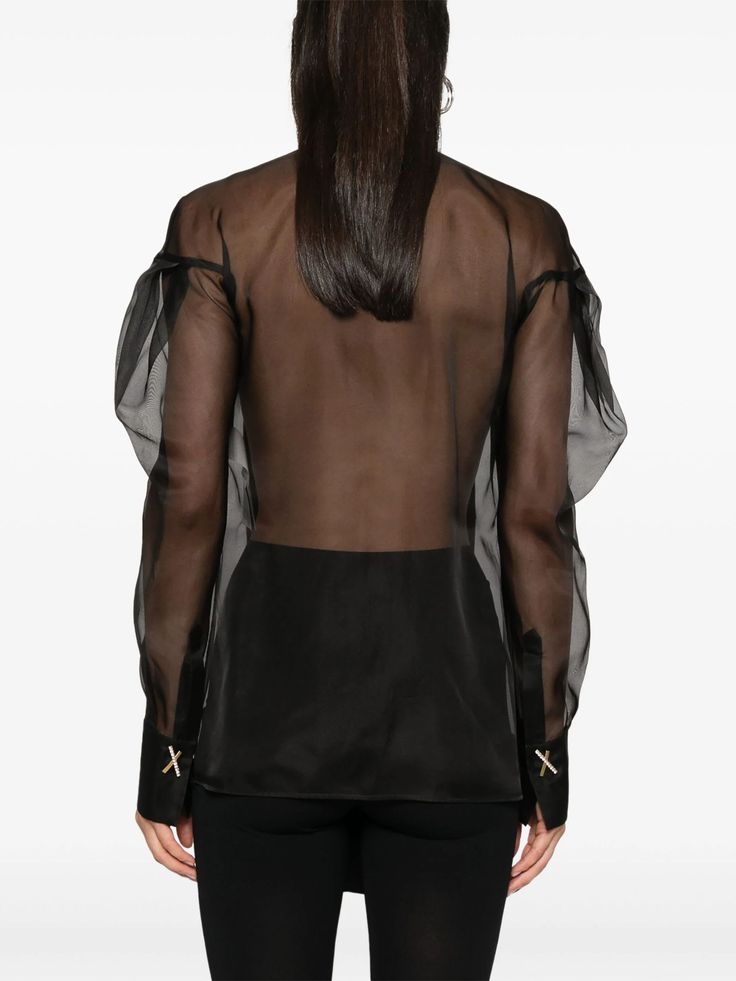 Black silk blouse, front press-stud fastening, semi-sheer construction, V-neck, long sleeves, press-stud fastening cuffs, side slits, straight hemComposition: Silk, 100% Luxury Sheer Blouse With Long Sleeves, Luxury Sheer Long Sleeve Blouse, Luxury Long Sleeve Sheer Blouse, Sheer Long Sleeve Office Blouse, Sheer Long Sleeve Blouse For Work, Luxury Sheer Long Sleeve Tops, Sheer Silk Office Blouse, Designer Sheer Long Sleeve Tops, Sheer Silk Long Sleeve Blouse