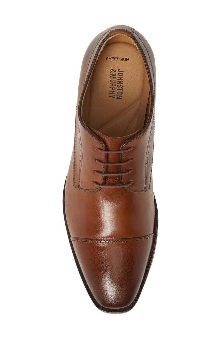 A bit of stylish broguing marks a rich derby crafted from supple full-grain leather. Leather upper and lining/rubber sole Imported Available online only Derby Oxfords With Almond Toe And Leather Lining, Almond Toe Oxfords With Leather Lining For Derby, Fitted Calf Leather Oxfords For Derby, Fitted Lace-up Shoes With Leather Lining, Workwear Derby With Brogue Detailing And Plain Toe, Workwear Derby Shoes With Brogue Detailing And Plain Toe, Leather Oxford Shoes With Goodyear Welt For Derby, Workwear Derby Shoes With Branded Insole And Almond Toe, Workwear Plain Toe Derby With Brogue Detailing