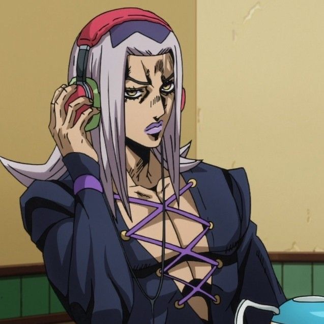 an anime character holding a cell phone to her ear while sitting in front of a table