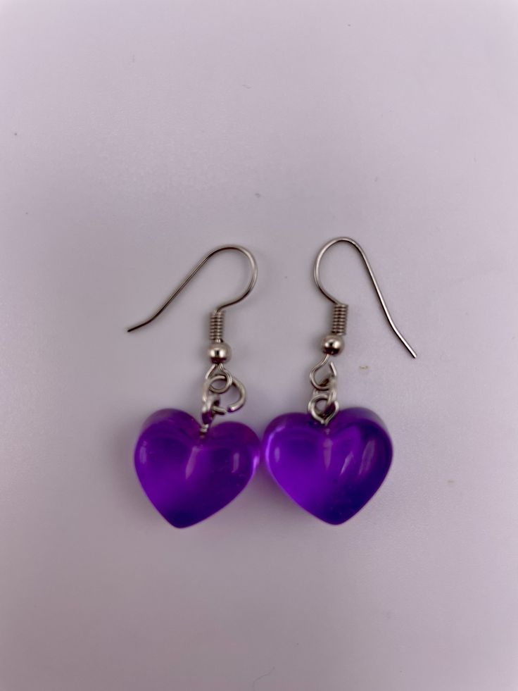 Materials Used:   -jump ring -1/2 inch hard plastic charm -Nickel Free Fish Hook  -Pack of 1 set Nickel-free Plastic Jewelry Gift, Cute Heart-shaped Pierced Jewelry, Clear Plastic Jewelry For Gifts, Clear Plastic Jewelry As A Gift, Clear Plastic Jewelry Gift, Cute Hypoallergenic Plastic Jewelry, Purple Novelty Jewelry For Pierced Ears, Trendy Purple Heart Earrings, Nickel-free Purple Heart Jewelry