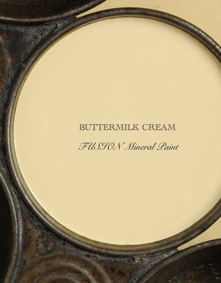 a close up of a plate on a table with the words buttermilk cream