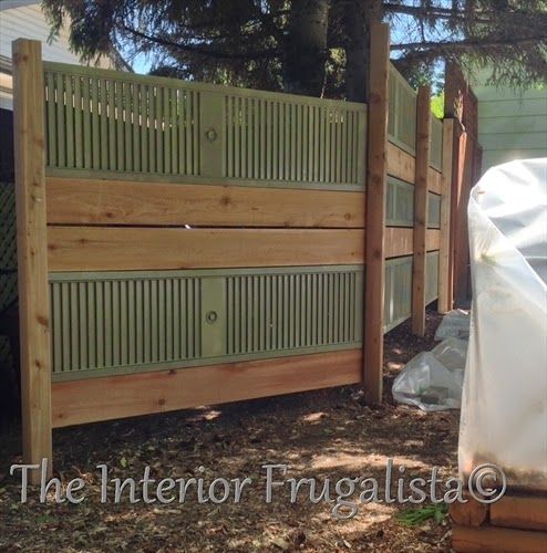 a wooden fence with plastic covering it