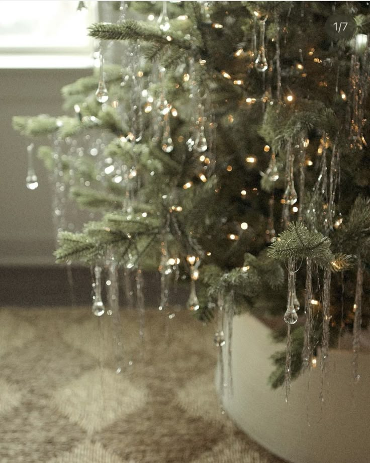 a christmas tree with icicles hanging from it