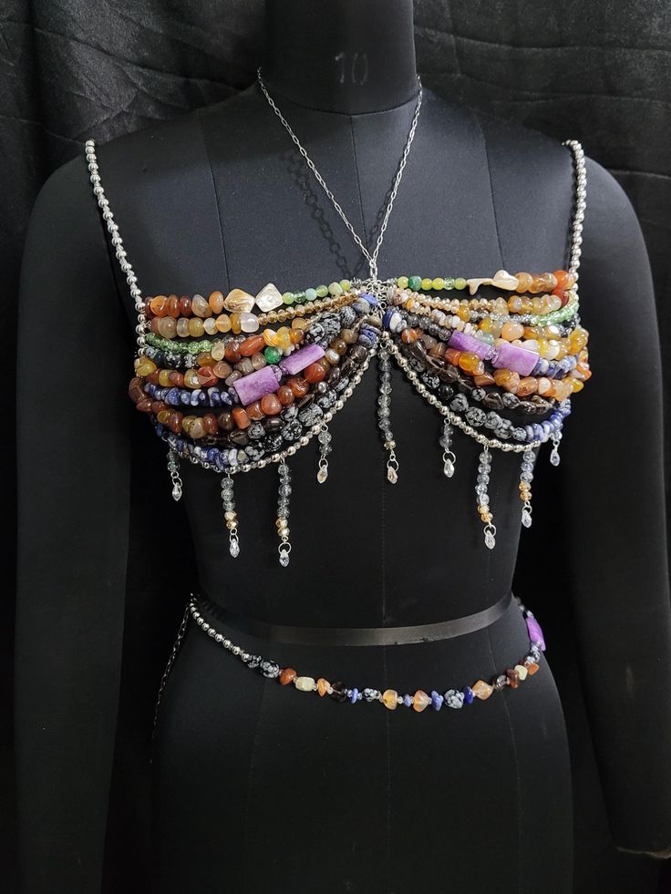 Details: - Includes : Bralette and Waist Chain Both - Materials: Natural Gemstones, Crystals & Alloy chain - Size: Please select the size appliable, and message for any clarification. - Customization: Available upon request - Shipping: Usually ships within 3-5 working days, with delivery in 8-15 days; If need earlier, please select expedited shipping at checkout and feel free to reach out to us for any clarification. Care Instructions: - Avoid contact with water and harsh chemicals - Store in a Beaded Bralette, Bead Threading, Body Chain Fashion, Beaded Bra, Rave Concert, Bead Bra, Mermaid Top, Mermaid Core, Burlesque Costume