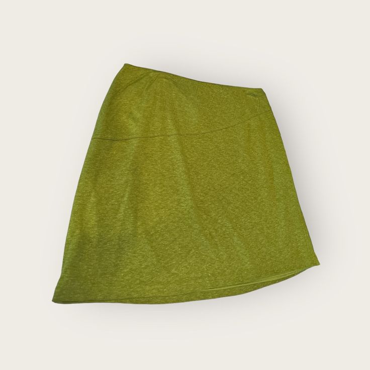 Green Plantium Linen And Polyester Skirt. Soft To Touch And Has Lining Green Stretch Lined Swim Skirt, Green Stretch Mini Skirt With Lined Skirt, Green Skirted Skort With Lined Skirt, Casual Green Mini Swim Skirt, Casual Green Lined Swim Skirt, Green Skirted Swim Skirt With Lining, Green Casual Flared Skort, Casual Green Flared Skort, Casual Green Swim Skirt For Spring