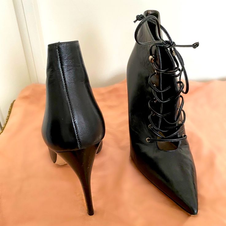 Miu Miu Black Calf Leather, Lace-Up, Hi-Heeled Boots. Like New With Shoe Bags; Worn Only A Couple Of Times; Bought A Size Too Small Never Fit Comfortably. European Size 37. Chic Lace-up Boots With Pointed Toe For Party, Elegant Closed Toe Lace-up Boots For Party, Chic Heeled Boots With Wrapped Heel And Round Toe, Chic Round Toe Heeled Boots With Wrapped Heel, Chic Closed Toe Heeled Boots For Party, Chic Party Heeled Boots With Almond Toe, Chic Almond Toe Heeled Boots For Party, Elegant Lace-up Boots With Round Toe For Party, Elegant Evening Ankle-high Lace-up Boots