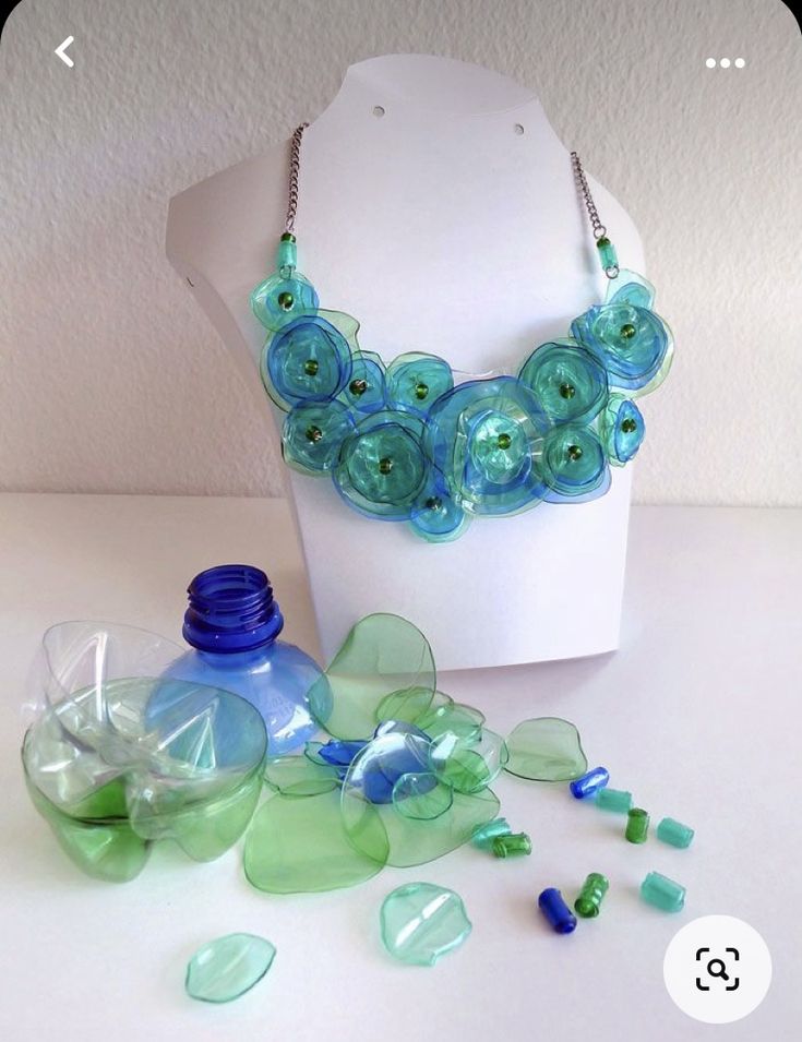 the necklace is made out of plastic bottles and beads