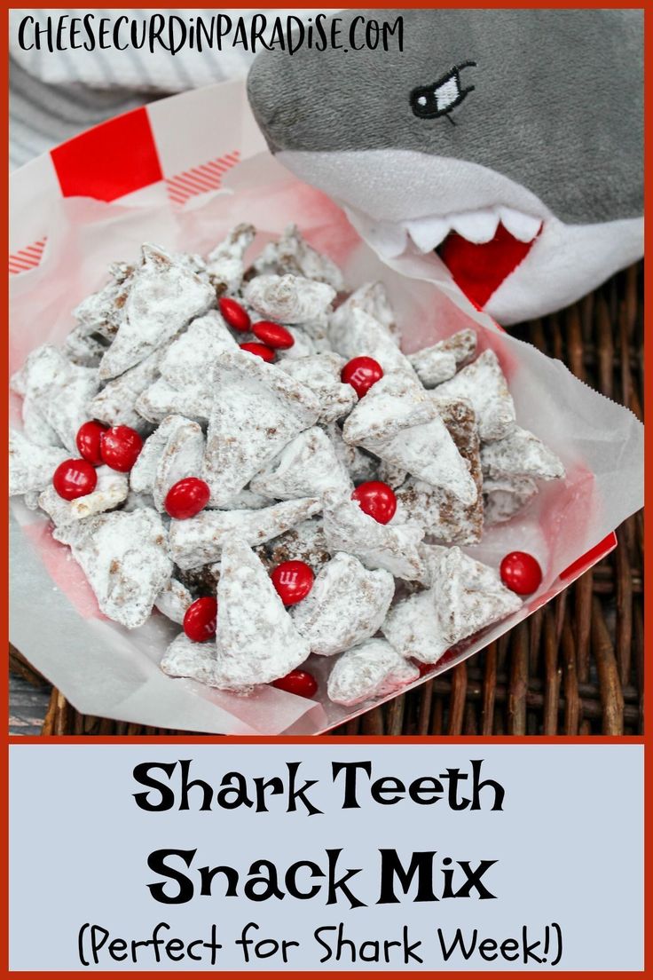 shark teeth snack mix with cherries on top and the title in red is above it