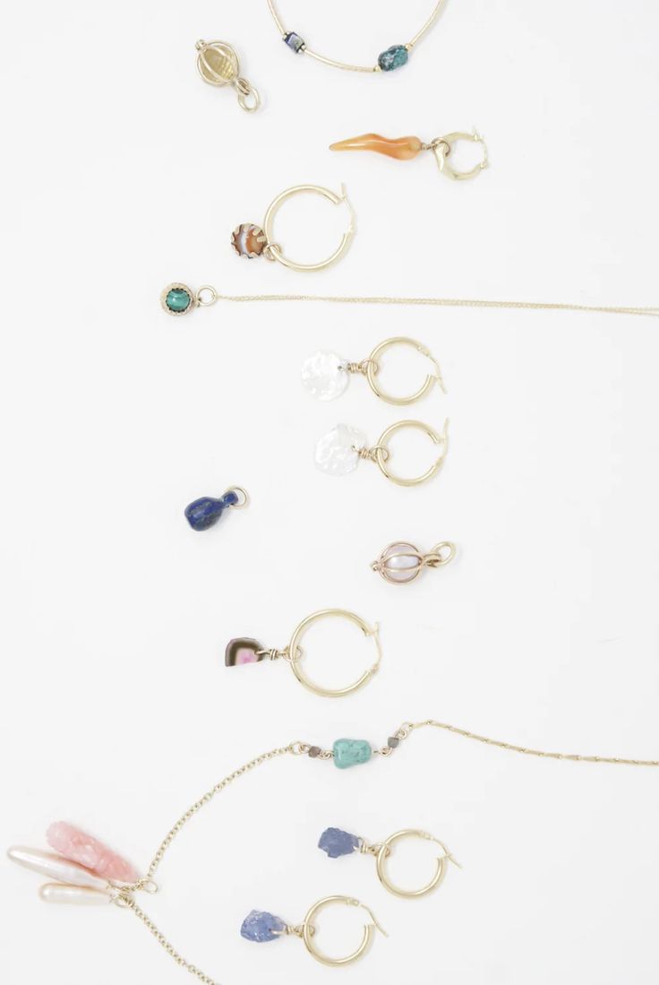 Tara Turner - Raw Tanzanite Hoop Earrings | Oroboro Store | New York, NY Single Huggie Earring In Recycled Gold, Everyday Brass Jewelry With Spring Ring Clasp, 14k Gold Filled Hoop Charms Jewelry, Everyday Small Hoop Earrings In Recycled Gold, Everyday Recycled Gold Small Hoop Jewelry, Dainty Small Hoop Gold Plated Jewelry, Dainty Gold-plated Small Hoop Jewelry, Everyday Small Hoop Recycled Gold Jewelry, Dainty Gold Plated Small Hoop Jewelry