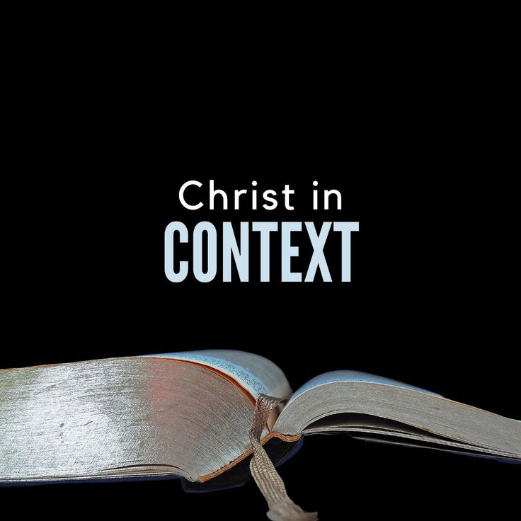 an open book with the words christ in contex on it's cover