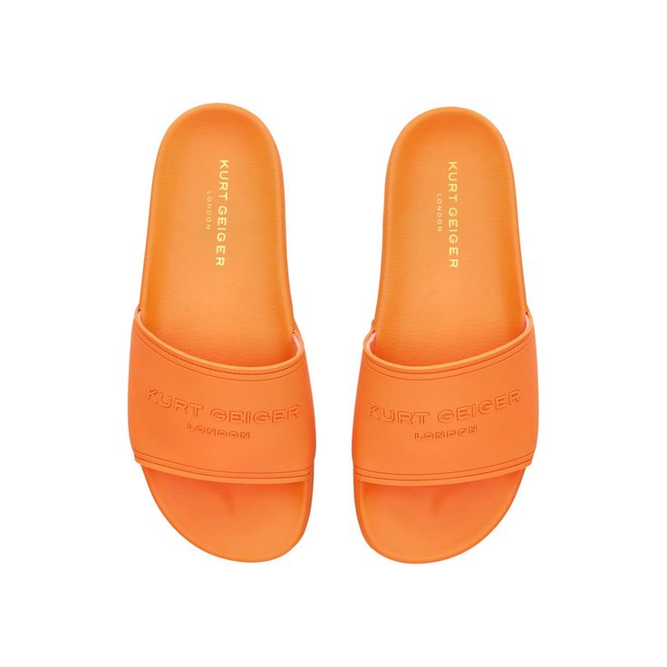 The KGL Pool Slider arrives in an orange slide on style. The wide toe strap is topped with branding in orange.Molded footbedMaterial: TextileStyle number: 2113091979 Orange Flat Synthetic Slippers, Flat Orange Sandals With Rubber Sole, Orange Flat Sandals With Rubber Sole, Comfortable Orange Slides With Round Toe, Comfortable Orange Round Toe Slides, Orange Slip-on Casual Slippers, Casual Orange Slip-on Slippers, Orange Round Toe Slides For Summer, Orange Non-slip Casual Slippers