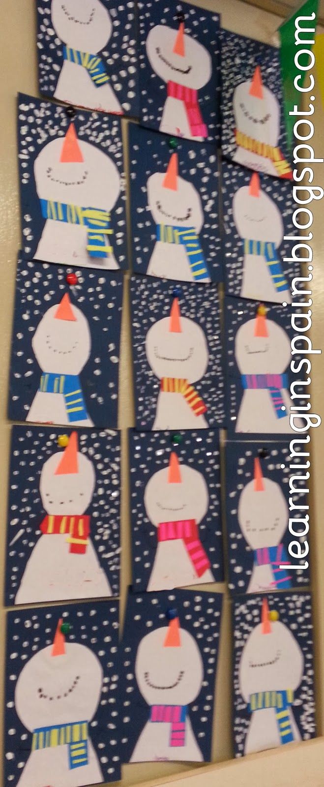 several snowmen with hats and scarfs on them are arranged in the shape of small cards