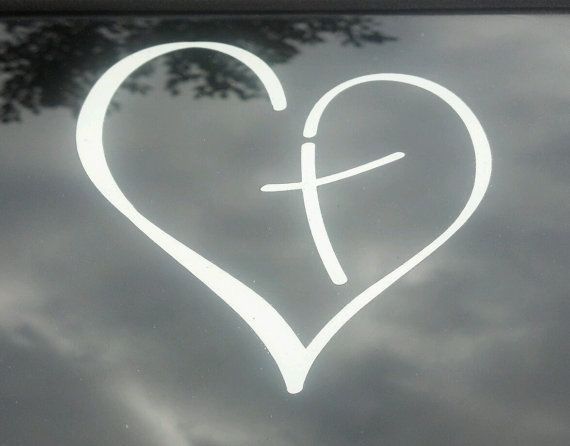 a heart with the word tattoo idea written on it and an image of a cross in the shape of a heart