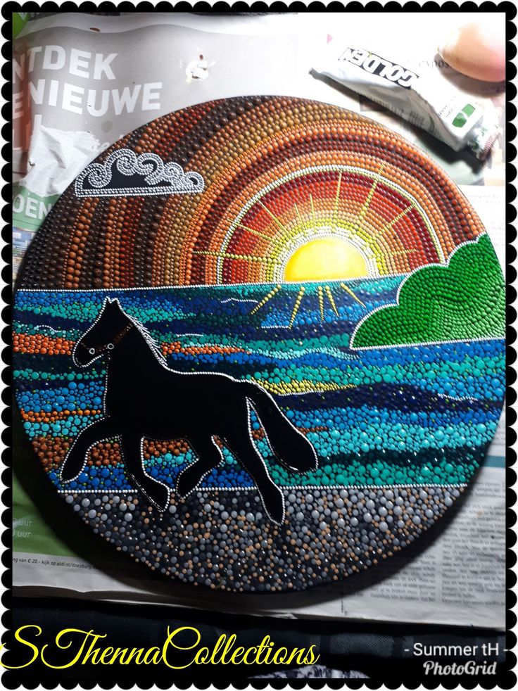 an image of a horse in the sunset on a plate that is made out of beads