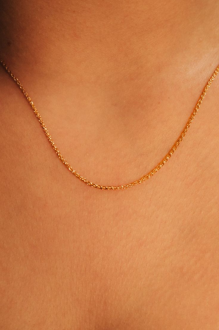 This vintage inspired Wheat Chain is the perfect touch of gold and looks great with pendants! Choose from 16" or 18" | Each necklace comes with a lobster clasp and 2" extender to customize your fit! Available only in 14K Gold Fill. It measures just over 1mm in thickness. This beautiful necklace is so simple and elegant - you'll never want to take it off! Every piece is organic and unique — no two Hannah Naomi pieces are exactly alike.Hand-crafted to order in our Portland, OR studio. Classic Gold Plated Chain Necklace With Delicate Chain, Classic Gold Plated Delicate Chain Necklace, Classic Rose Gold Charm Necklace With Delicate Chain, Classic Gold Necklace With Cable Chain, Classic Gold Cable Chain Necklace, Classic Rope Chain Link Necklace For Gift, Elegant 14k Gold-filled Chain Necklace With Lobster Clasp, Classic Gold Plated Chain Necklace With Lobster Clasp, Classic Gold Charm Necklace With Cable Chain