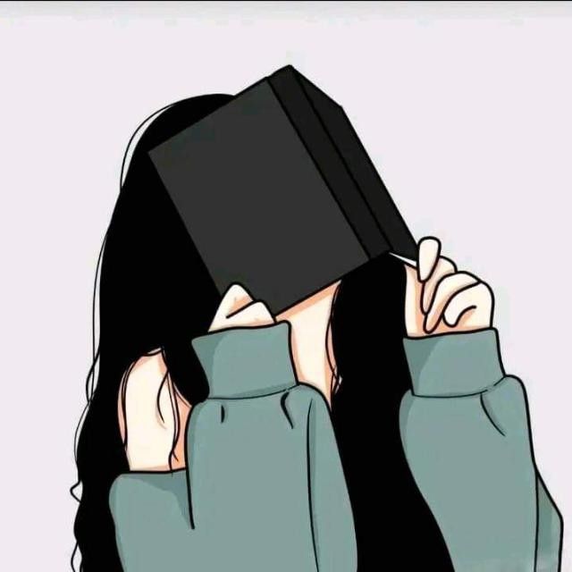 a woman covering her face with a book