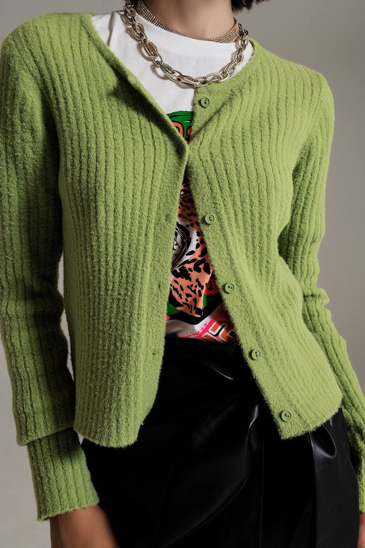 Wrap yourself in comfort and style with our Green Super Soft Fluffy Knit Cardigan. This cardigan features a luxurious and soft fluffy knit design, perfect for staying warm and fashionable. Crafted from 100% polyamide, it offers a cozy and lightweight feel. With a bodycon fit and 3/4 length sleeves, it provides a trendy and flattering silhouette. The button placket adds a touch of elegance and functionality to the cardigan. Whether for a party or a casual outing, this green fluffy knit cardigan e Short Green Cardigan, Green Winter Outfits, Green Cardigan Outfit, Cardigan Sleeves, Cardigan Verde, Thrift List, Small Cardigan, Soft Knit Cardigan, Fluffy Knit