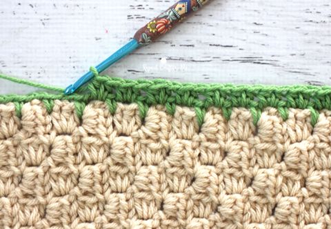 the crochet stitch is being worked on