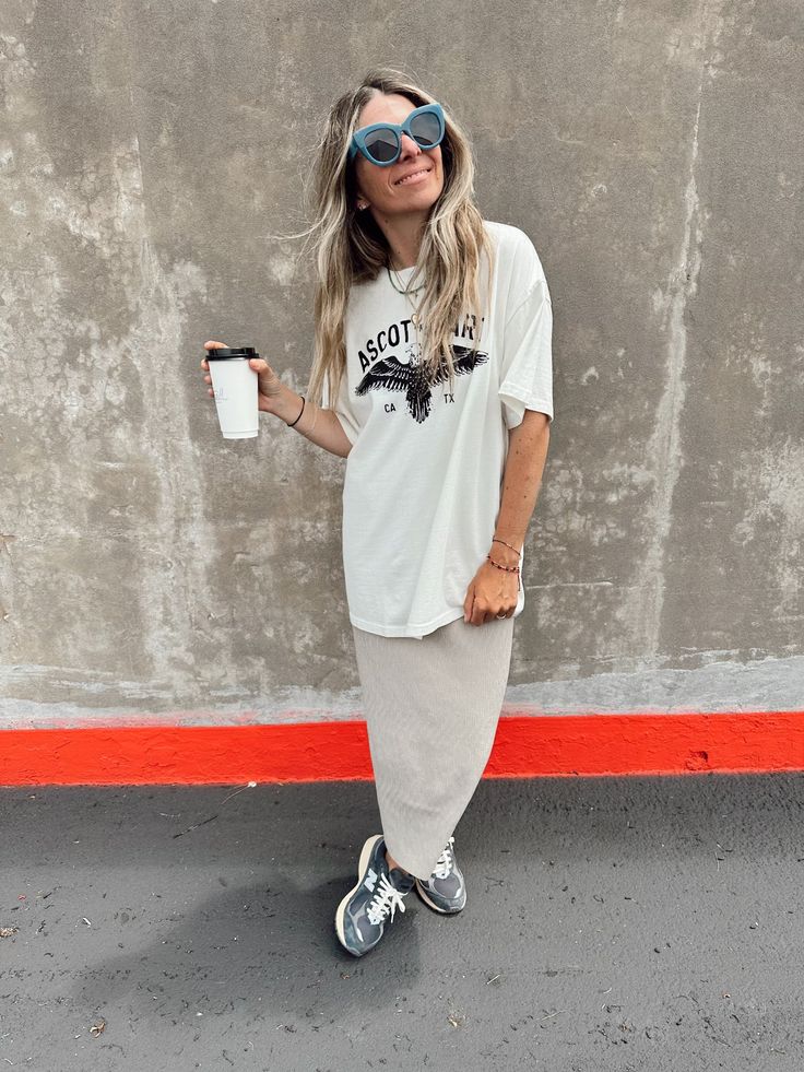 Our favorite tee of the season! Runs true to size. Size up if you want an oversized fit like photos. Laura is 5’4” tall and wearing a Large Astro Dust, Look Boho Chic, Eagle Tee, Perfect White Tee, Look Fashion, Skirt Fashion, Spring Summer Fashion, Fashion Inspo Outfits, Cool Outfits