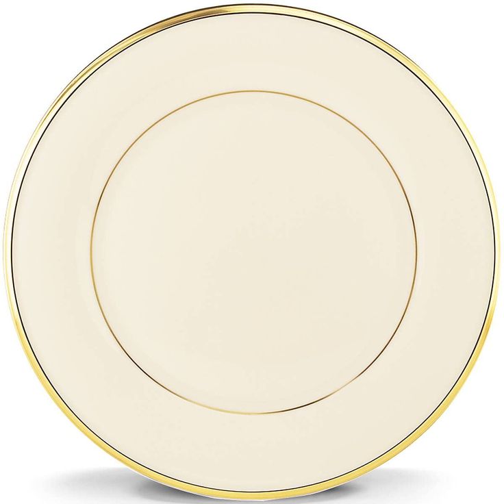 an empty white plate with gold trim