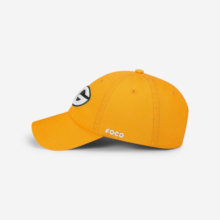 a yellow hat with the word foo on it and a white eyeball in the center