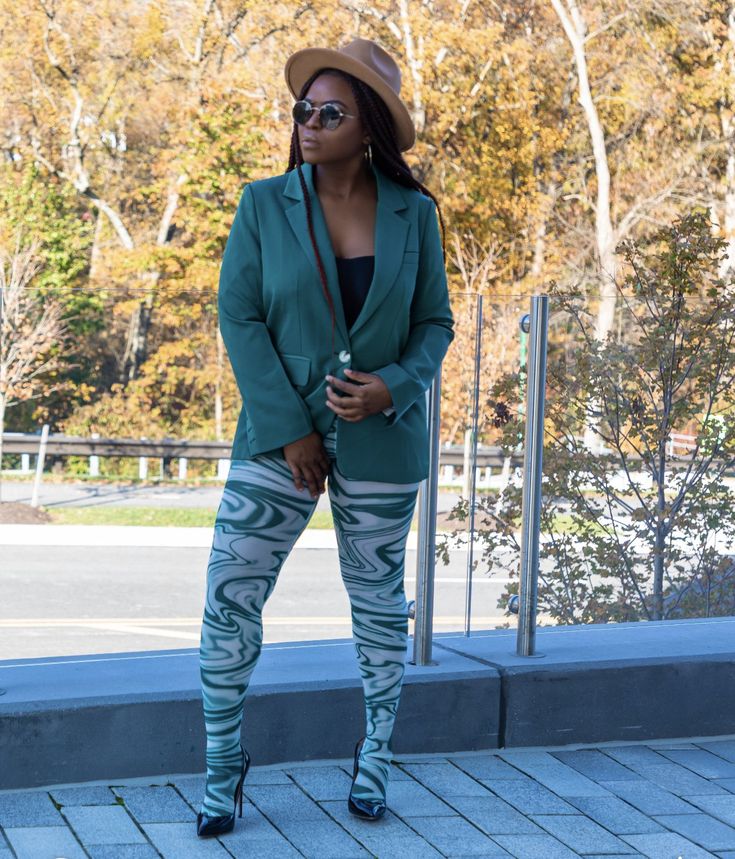 Make your wardrobe pop with this luxe blazer. Its a green material with an oversized fit and one button detailing. style this blazer with matching leggings and heels or boots for a look that is sure to get noticed this season. Model is wearing Large for the blazer and small for the leggings Please Note: due to the difference in lighting the items might look different Leggings And Heels, Green Blazer, Matching Leggings, Green Material, Over Knee Boot, Make Your, Leggings, Blazer, Wardrobe