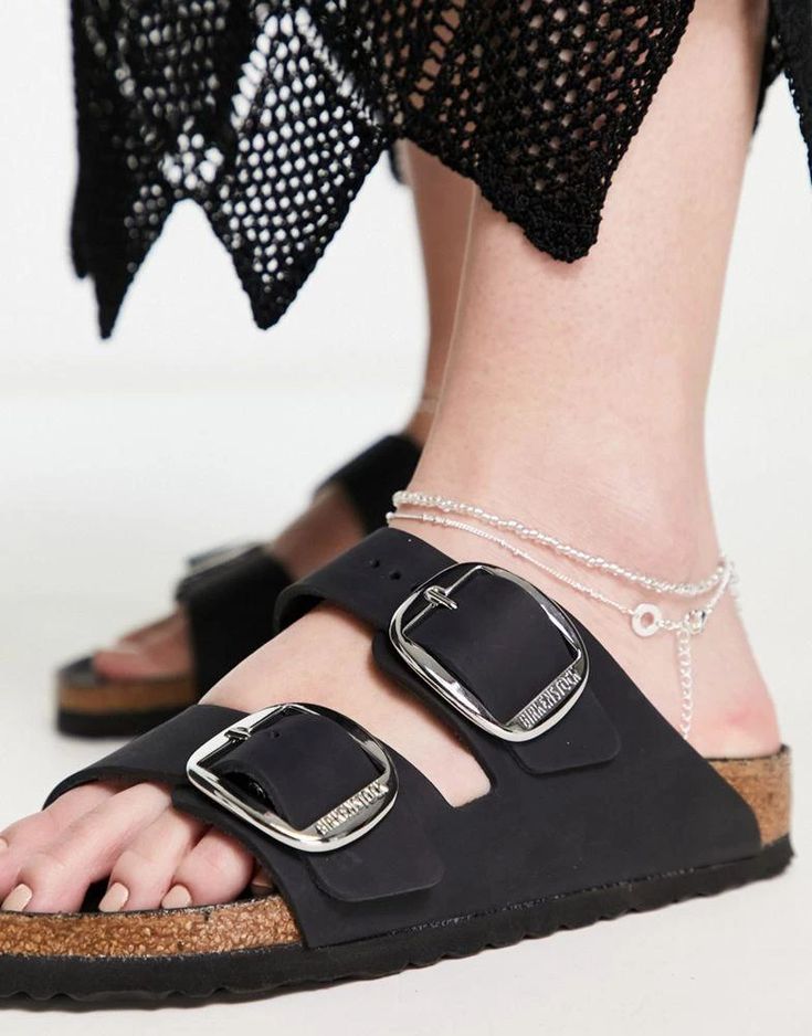 Elevate your casual style with these Instagram-worthy Birkenstock Arizona Sandals. Featuring adjustable pin buckle straps for a customized fit and classic cork footbed for comfort from morning yoga to beach bonfires. The black leather upper provides effortless chic to complement your summer flannels or weekend brunch fits. Durable EVA sole stands up to city sidewalks or sandy shores. Made for endless toe-baring selfies and wanderlust-feed worthy outfits, these Arizona Sandals are the ultimate wa Beach Sandals Outfit, Brunch Fits, Summer Flannel, Sandals Outfit Summer, Birkenstock Arizona Big Buckle, Arizona Big Buckle, Birkenstock Style, Pretty Sandals, Birkenstock Sandals Arizona