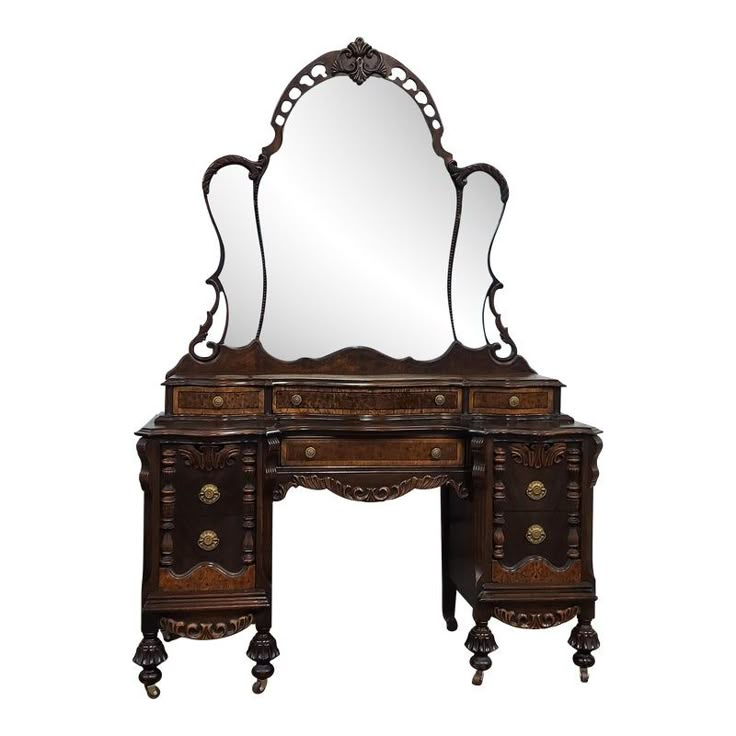 an antique wooden vanity with mirror on it's side and legs, in the style of louis ii