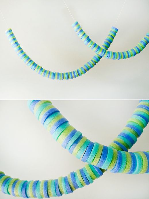 two pictures of blue and green striped yarn hanging from strings, one has a string attached to it