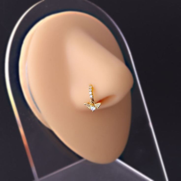 a close up view of a ring on a mannequin's dummy head