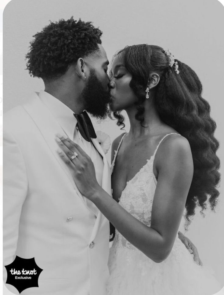 a man and woman kissing each other in front of a white background with the caption's name on it