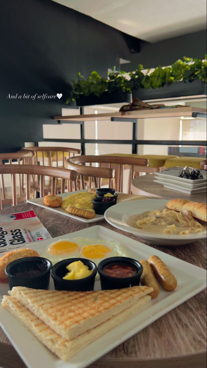 some food is laying out on plates on a table