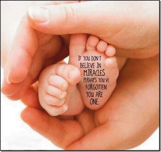 a hand holding a baby's foot with the words if you don't believe in