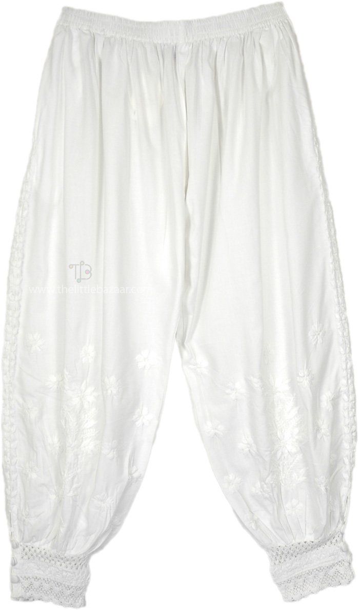 Muslin Cotton Pajama Pants in white, featuring a relaxed fit with a wide, elastic waistband for comfort.  The pants taper at the ankles, secured with a three-button tie, adding a touch of vintage charm. #tlb #SplitSkirtsPants #WhitePants #EthnicPants White Cotton Pants With Resham Embroidery, Bollywood Style Embroidered Cotton Pants, Embroidered White Ankle-length Pants, Chic White Ankle-length Harem Pants, White Cotton Ankle-length Harem Pants, Cotton Pajama Pants, Gaucho Pants, Pointy Shoes, Semi Formal Wear