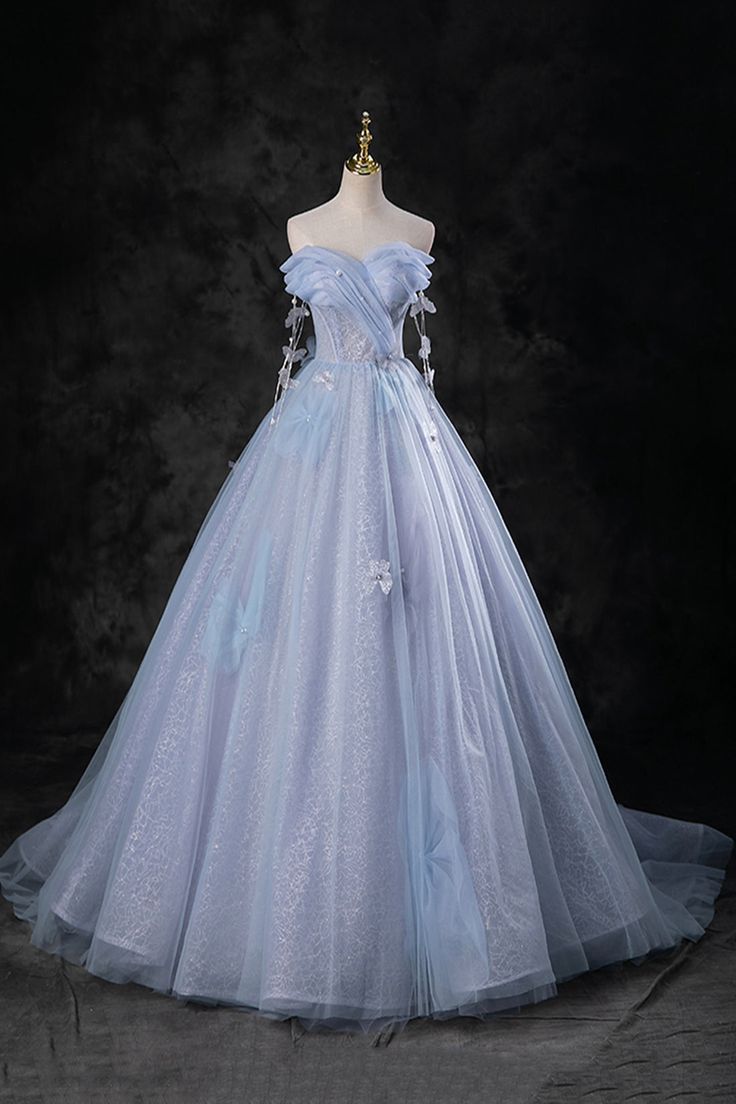 The Blue Tulle Long A-Line Prom Dress Party Dress is a stunning choice for any special occasion. With its A-line silhouette and elegant blue tulle fabric, it radiates timeless beauty. Whether it's prom night or a formal event, this dress ensures you look effortlessly chic and captivating.Crafted from sumptuous black tulle, creating an ethereal and enchanting silhouette. The tulle fabric moves gracefully with every step, making you feel like you're floating on air. Product Code: Vi13775 Silhouett Cinderella Inspired Dress Prom, Ethereal Prom Dress Elegant, Blue Princess Dress Aesthetic, Blue Fairytale Dress, Blue Gowns Elegant, Blue Ball Gown Prom Dresses, Ethereal Prom Dress, Light Blue Prom Dresses, Poofy Prom Dresses