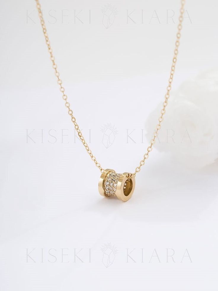 NOT GOLD PLATED, NOT GOLD FILLED! All our jewelry are stamped with a gold hallmark to certify the metal purity of the item. Price listed is for Pendant/ Charm Only. The necklace chain is sold separately here:  https://www.etsy.com/listing/677473471/gold-chain-choker-made-from-pure-14k Product Details *14K SOLID GOLD *CUBIC ZIRCONIA *DIMENSION: DIA 6.8x WIDTH 6.3MM 💓Tarnish resistant and sweat resistant  💓Hypoallergenic, made without lead, nickel and cadmium Gold Information *9K gold is 9 parts Tube Necklace, Gold Chain Choker, Mini Necklace, Zero One, Minimal Necklace, Wedding Jewellery Necklace, Gold Geometric, Chain Choker, Pure Gold