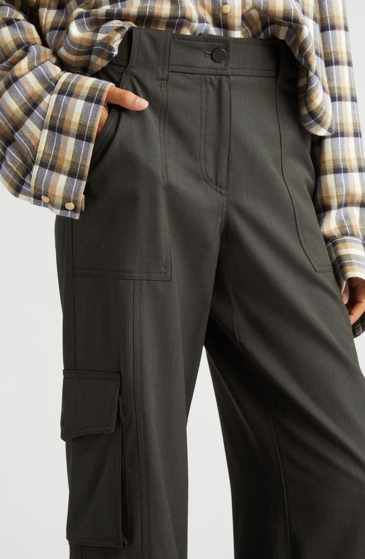 Cargo pants are on the comeback trail, and this stretchy wool pair is a polished way to take on the trend. 31 1/2" inseam; 25" leg opening; 11" front rise; 15 1/2" back rise (size 8) 97% wool, 3% elastane Dry clean Made in the USA Classic Fitted Pants With Cargo Pockets, Fitted Cargo Pants With Welt Pockets For Work, Fitted Bottoms With Cargo Pockets For Workwear, Fitted Pants With Side Pockets For Fall, Classic Fitted Cargo Pants For Workwear, Seam Detailed Pants For Workwear, Classic Cargo Pants For Fall Workwear, Classic Fall Cargo Pants For Workwear, Fall Workwear Full-length Cargo Pants