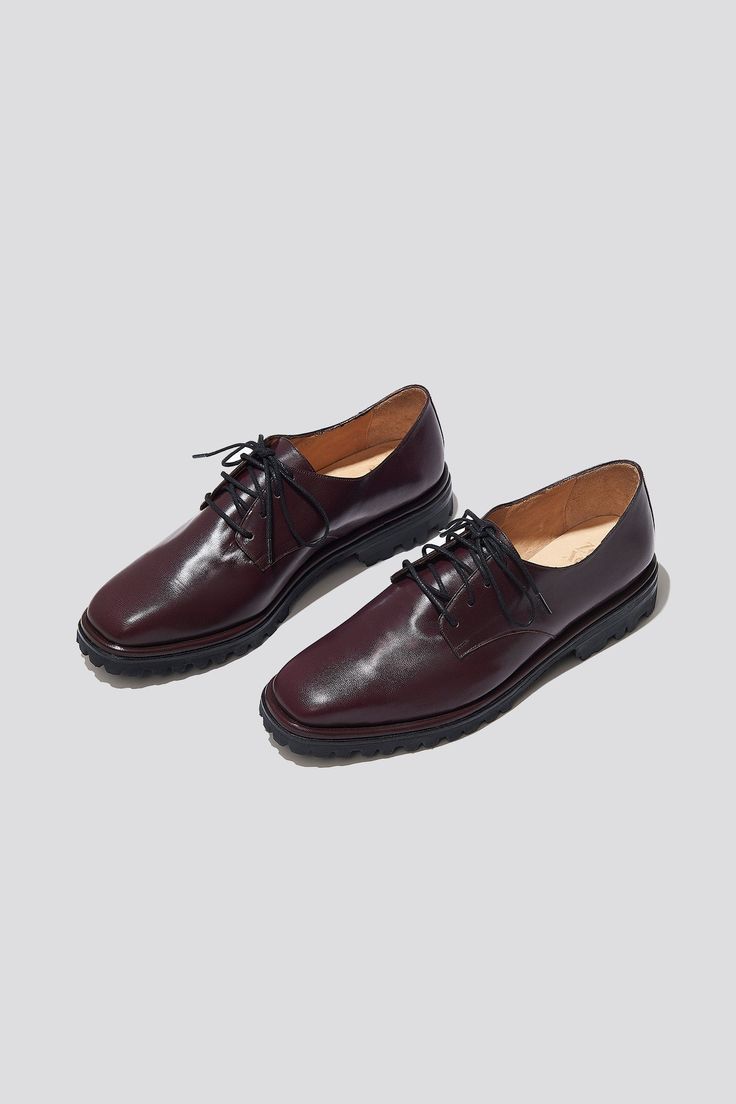 The Lydia Derby is a chunky lace up flat with a feminine shape. Featuring a lug sole and a clean upper, this style is more refined than a sneaker, but more informal than a slip-on loafer. Lydia in Pinot can be styled with brown laces for a sleek look or with chunky red ones for more offbeat styling. We love the Lydia styled back to socks in the winter, but they will also look cool sockless in warmer temps. This makes a great year-round style to add to your rotation. Both sets of laces are includ Modern Lace-up Loafers With Rubber Sole, Fall Derby Low-top Lace-up Shoes, Lace-up Oxfords With Contrast Sole For Work, Classic Low-top Lace-up Shoes With Lug Sole, Low-top Lace-up Shoes With Brogue Detailing For Work, Lace-up Lug Sole Oxfords For Work, Lace-up Oxfords With Lug Sole For Work, Casual Lace-up Shoes With Vibram Sole For Work, Fall Derby Oxfords With Lug Sole