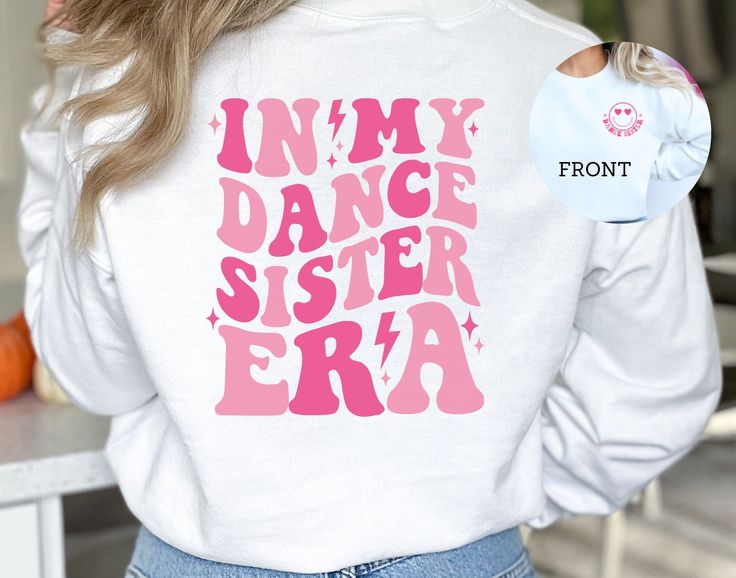 "🌟 Embrace Your Dance Journey with Style! 🌟 Step into the spotlight with our cozy \"In My Dance Sister Era\" Sweatshirt, the perfect blend of comfort and inspiration for anyone living the dance sister life! This isn't just a sweatshirt; it's a warm hug that celebrates every pirouette, leap, and shuffle. Made with a soft cotton blend, it's like wearing a cloud, designed to keep you snug whether you're warming up in the studio or chilling after a thrilling performance. Each sweatshirt is crafted with care, featuring a durable print that boldly declares your passion for dance. The fabric is a mix of cotton and polyester, promising breathability and resilience through countless rehearsals and wash cycles. Available in a range of sizes, our sweatshirt is designed to fit every dancer's unique Dance Sister Shirt, Dance Team Shirts, Dancer Gifts, Funny Dancing, Dance Mom Shirts, Dance Teacher Gifts, Dancer Gift, Sister Shirt, Lil Sis