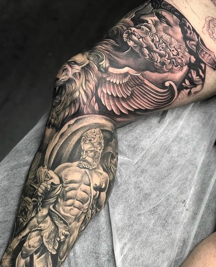 a man with a tattoo on his arm