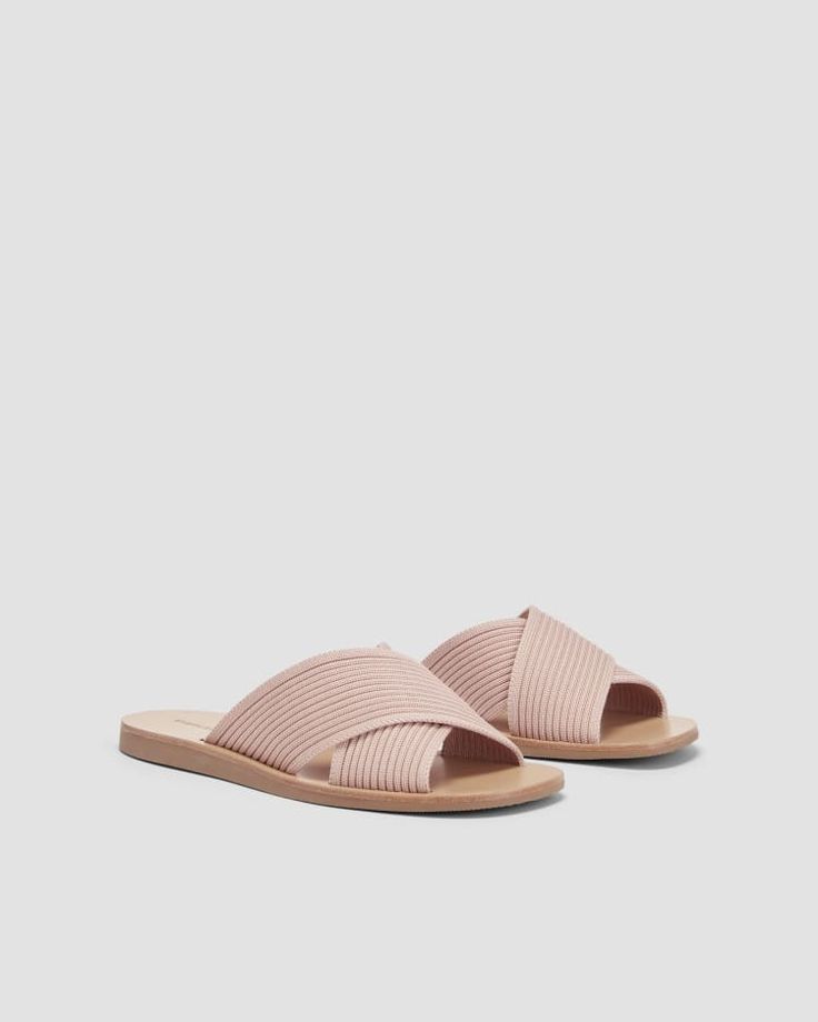 The Day Crossover Sandal Pale Pink – Everlane Spring Synthetic Slides With Leather Sole, Comfortable Everyday Spring Flip Flops, Comfortable Summer Slippers For Everyday Use, Comfortable Everyday Summer Slippers, Slip-on Summer Sandals For Everyday, Summer Slip-on Everyday Slippers, Summer Slip-on Slippers For Everyday, Summer Textured Footbed Sandals For Everyday Use, Summer Footbed Sandals With Textured Footbed For Everyday