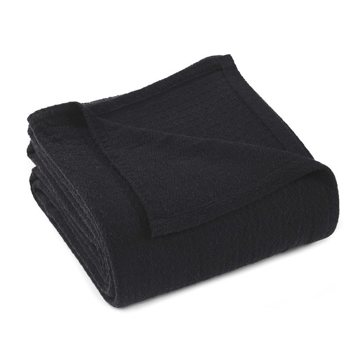 three black towels folded on top of each other