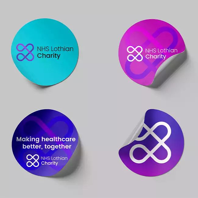 four circular stickers with different logos on them