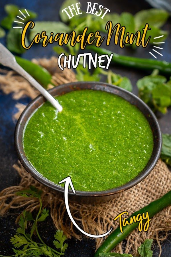 the best coriander mint chutney recipe is in a small bowl with a spoon