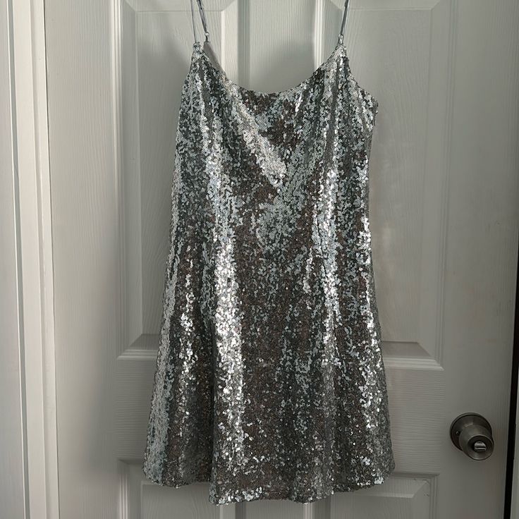 Sequin Silver Dress. Adjustable Straps. Never Been Worn. Zipper On Side Measurements : Armpit To Bottom - 23 1/2 Inches Underbust - 14 Inches Waist - 18 Inches Sequin Silver Dress, Silver Sequin Dress, Urban Dresses, Urban Outfitters Dress, Silver Dress, Urban Outfitters, Colorful Dresses, Adjustable Straps, Sequin