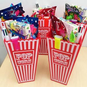 Top Movie Night Party Favors Kids Will Love Kids Party Goodie Bags, Movie Birthday Party Favors, Kids Movie Party, Treat Bag Ideas, Movie Night Party Favors, Goody Bag Ideas, Birthday Movie Night, Disney Movie Night Food, Diy Movie Night