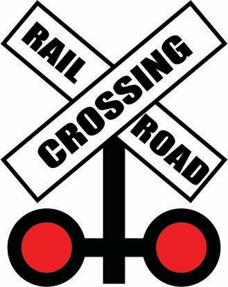 a railroad crossing sign with the word rail crossing on it