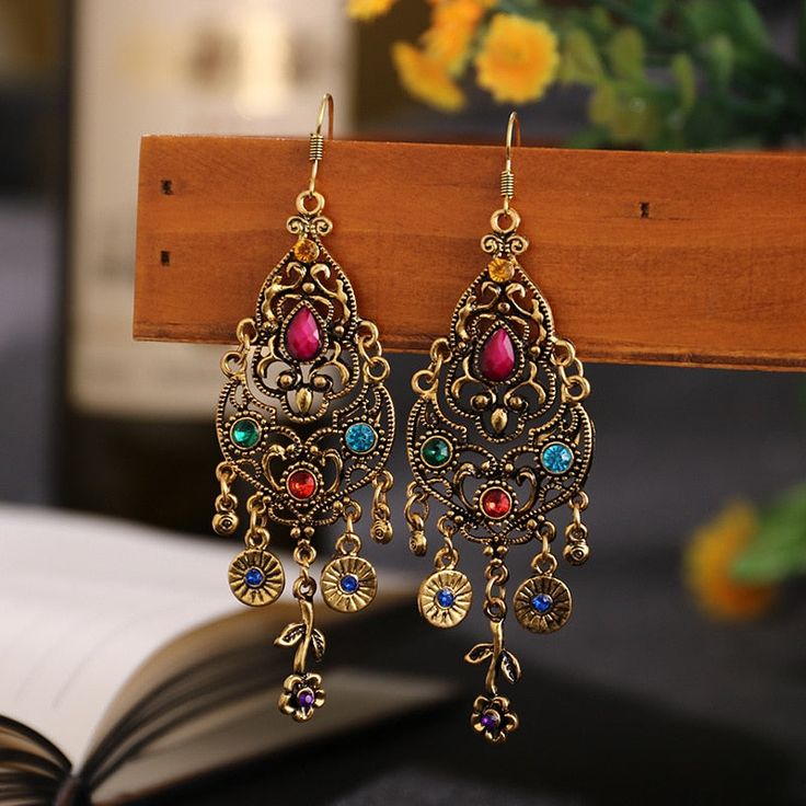 Ethnic Carved Long Earrings Women Hollow Flower Wedding JewelryType: Bohemian Jewelry Style: Indian Earrings Style: Bohemia Shape\pattern: Water Drop Brand Name: Genuine-Gemstone Metals Type: 14k yellow gold plated, silver Material: Rhinestone Item Type: Earrings Gender: Women Earring Type: Drop Earrings Earring Orient: Earring Woman Retro Earring, Indian Earrings, Ethnic Earrings, Long Dangle Earrings, Bohemian Earrings, Ethnic Jewelry, Retro Stil, Vintage Bohemian, Rhinestone Earrings