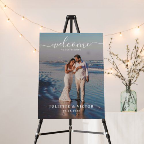 an easel with a wedding photo on it